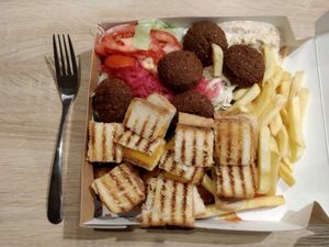 Fari's vegan offer, fork for scale at Fari's in Ljubljana