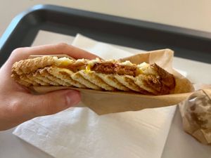 Vegan toast with “cheese” and “meat” slices at Fari's in Ljubljana