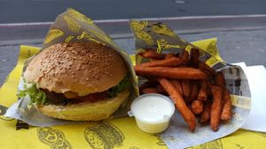 Vegan cheeseburger, sweet potato fries, vegan mayo at Fari's in Ljubljana