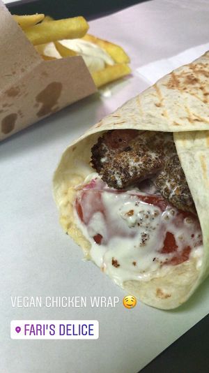 Vegan chicken wrap with chips  at Fari's in Ljubljana