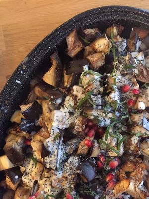 Aubergines rôties, sauce tahini, grenade et menthe at Yem'a Paris in Paris