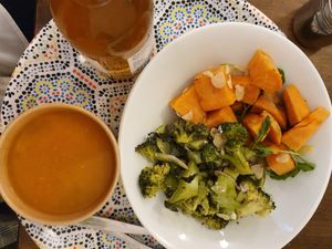 Carrot/cumin soup with sweet potato and broccoli on the side + green tea lemon ice tea at Yem'a Paris in Paris