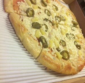 jalapeno-pineapple pizza with Daiya cheeseness at Graffiti's Pizza in Mcdonough