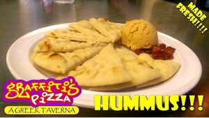 Come enjoy our new House Hummus. Our homemade hummus comes with pita bread and your choice of sun-dried tomatoes or roasted red peppers for $4.95! at Graffiti's Pizza in Mcdonough