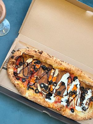 Nieboczek pizza (sauce on the right is garlic, not vegan)  at Pizzatopia in Krakow