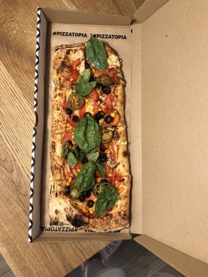 V cheese, mushrooms, corn,tomatoes, olives, jalapenos, pepper and spinach pizza at Pizzatopia in Krakow