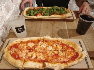 Margherita (vegetarian)  and the vegan pizza at Pizzatopia in Krakow