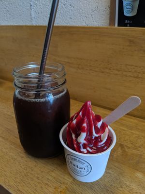 Soy soft serve with raspberry topping and iced coffee. at Ballon in Tokyo