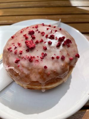 Vegan raspberry donut at Donut Shop in Prague
