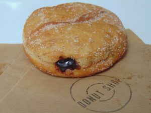 Vegan chocolate filled donut at Donut Shop in Prague