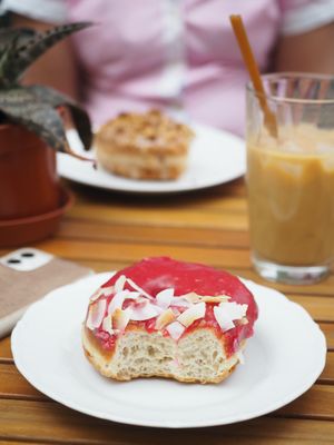Vegan coconut raspberry donut at Donut Shop in Prague