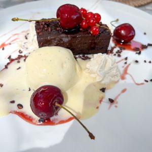 Sweet potato brownie with glazed cherries from Mallorca  at Cal Reiet's Table in Mallorca
