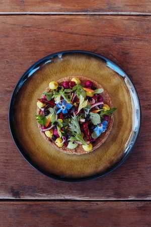 Majorcan flatbread 'coca' made with activated buckwheat at Cal Reiet's Table in Mallorca