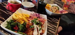 Baked potatoes with chili & coronation chickpea at Fat Rabbit in Oswestry