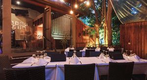 Indoor/outdoor seating at Watergate in Port Douglas