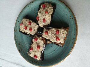 Grilled aubergine with walnut paste and pomegranate at Daredzhani in Almaty