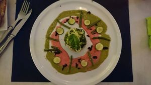 choux farci aux légumes, palet de pois chiche grillé, spaghetti de courgettes  at Annadata in Saint-malo