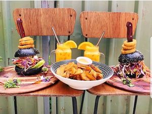 Pulled jackfruit vegan burgers. So delicious! Lots of interesting and fresh Asian flavours and home made onion rings.  at Handsome Her in Brunswick