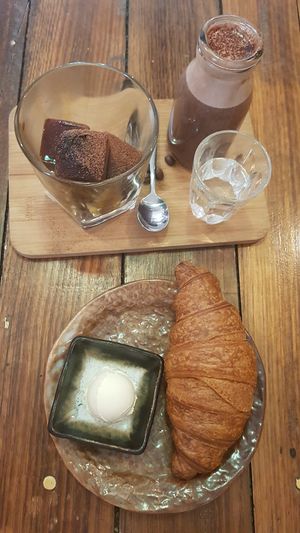Croissant and iced mocha. at Handsome Her in Brunswick