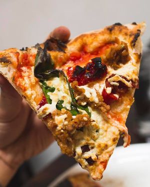 Vegan cheese and sausage at MidiCi in Katy