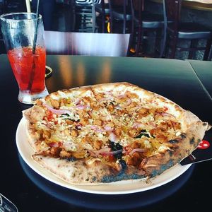 Vegan cheese and sausage option at MidiCi in Katy