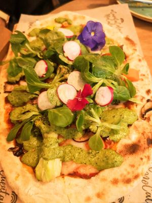 Rainbow pizza at Superchulo in Madrid
