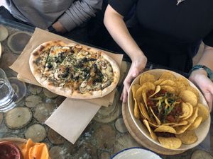 Pizza and nachos, fine. at Superchulo in Madrid