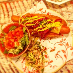 Moving Mountains hotdog and salad at Lounges - Curio Lounge in Stroud