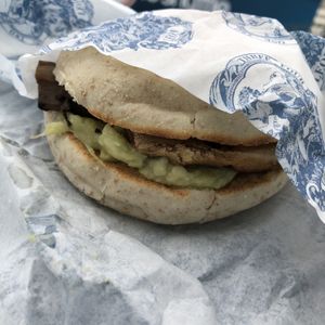 Mushroom and Avocado breakfast muffin with tomato salsa  at LEON in Folkestone