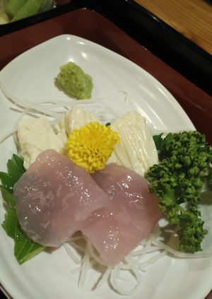 Two varieties of vegan sashimi: yuba and konyaku, served with a little wasabi. The fish-looking sashimi is made from konyaku (a type of yam) and is chewy. at Bell Cafe in Nikko