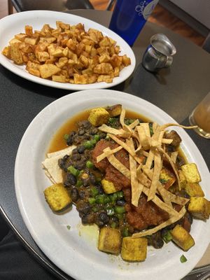 Vegan huevos rancheros with a side of home fries   at The Nova Cafe in Bozeman