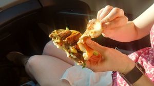 Half eaten Hawaiian Burger. at E Burger in Columbus