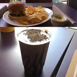 Burger with nachos and guacamole with shake. at Hareburger in Sao Paulo