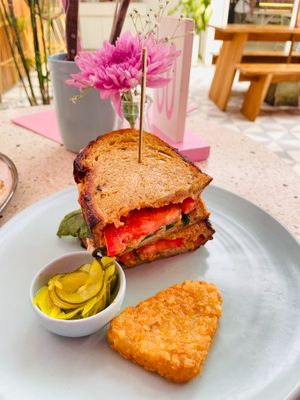 Sunny Ride Burger with hash browns at Kynd Community - Seminyak in Seminyak