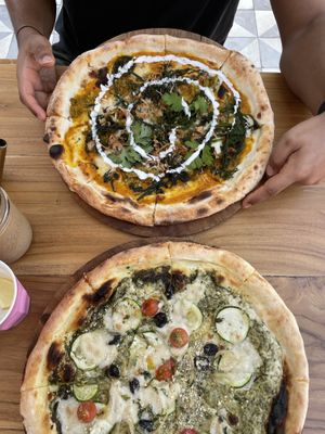 Pesto pizza on bottom (can’t remember top)  at Kynd Community - Seminyak in Seminyak