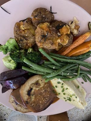 Vegan “Cheekan” Sunday Roast. Cranberry sauce and extra gravy not featured.  at Kynd Community - Seminyak in Seminyak