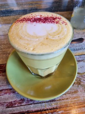 Turmeric latte at Buddha Bowl Cafe in Newtown