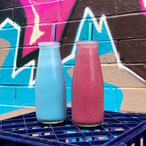 Blue Algae Smoothie and Berry Boost Smoothie at Buddha Bowl Cafe in Newtown
