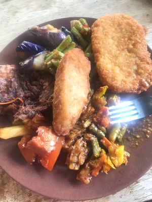 Assortment of delicious fooood? hash brown, eggplant, beans, tempe, and a sweet and sour dish at Evergreen Vegetarian House 长青素食之家 in Penang