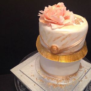 Golden celebration cake.. at Vegangela Rose Cakes in Cwmllynfell