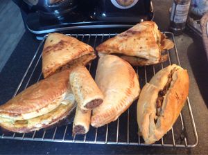 Pasties and sausage rolls.. Cheese and onion pasty,Cornish,sweet potato mild curry pasty,mushroom tomato and chees pasty,and spicy carrot and cashew sausage roll. at Vegangela Rose Cakes in Cwmllynfell