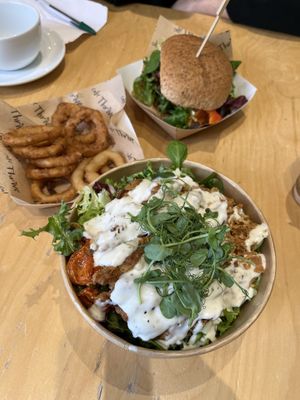 Build a salad, whole food burger and onion rings  at Cafe Thrive in Southampton