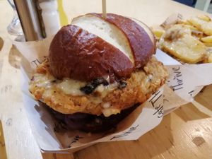Oktoberfest special: "chicken" patty, pretzel bun, lots of stuff! at Cafe Thrive in Southampton