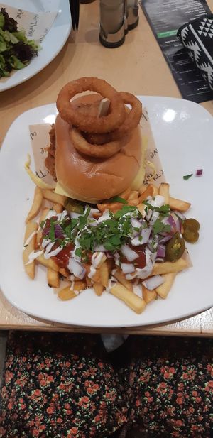 Seitan chicken burger with loaded chips at Cafe Thrive in Southampton