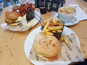 "Meaty" burger and "Chicken" burger (all vegan) at Cafe Thrive in Southampton