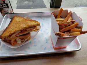 vegan buffalo tofu melt and fries at Roxy's Grilled Cheese in Allston