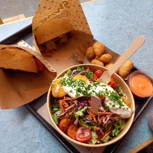 half of Vienna burger for me and my husband, chili sauce, nugget salad, and cheese bites at Swing Kitchen - Kaiserfeldgasse in Graz