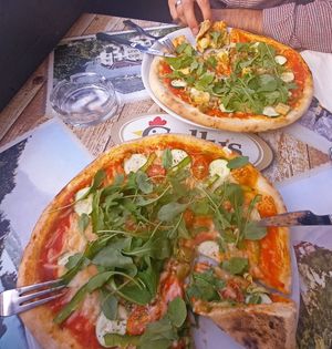Two different pizzas, but taste almost the same  at Pizzeria Gallus in Bled