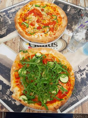 upper one: "vege-pizza" with vegan cheese, down one: "vegan pizza" at Pizzeria Gallus in Bled