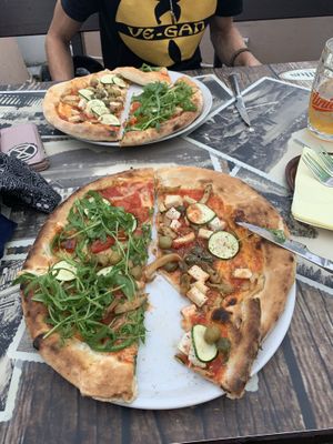 Tofu pizza and vegetable and rocket pizza.  at Pizzeria Gallus in Bled